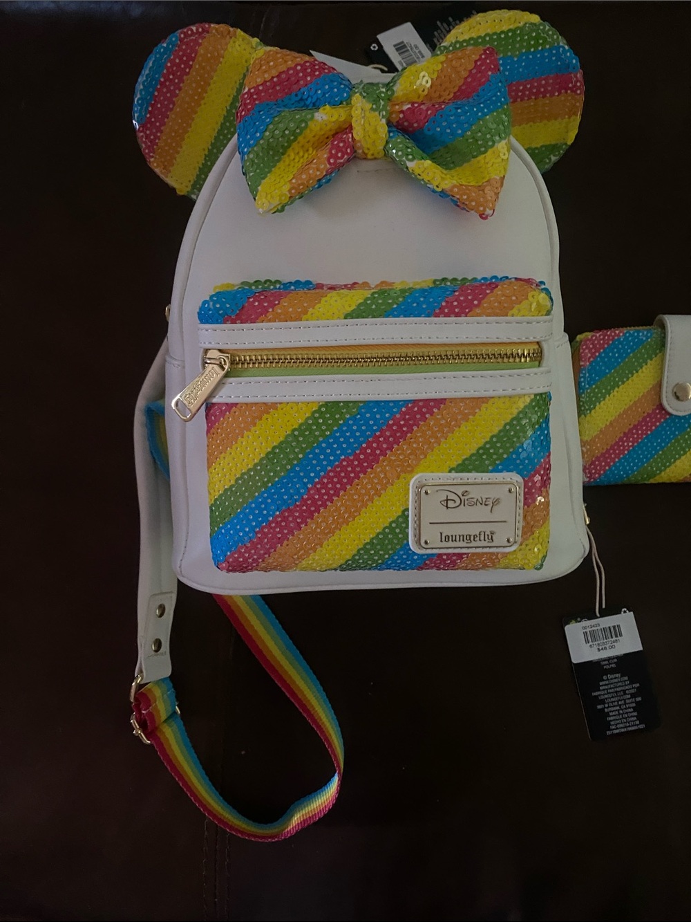 Loungefly White Mini Backpack with Rainbow Sequin Ears and Bow